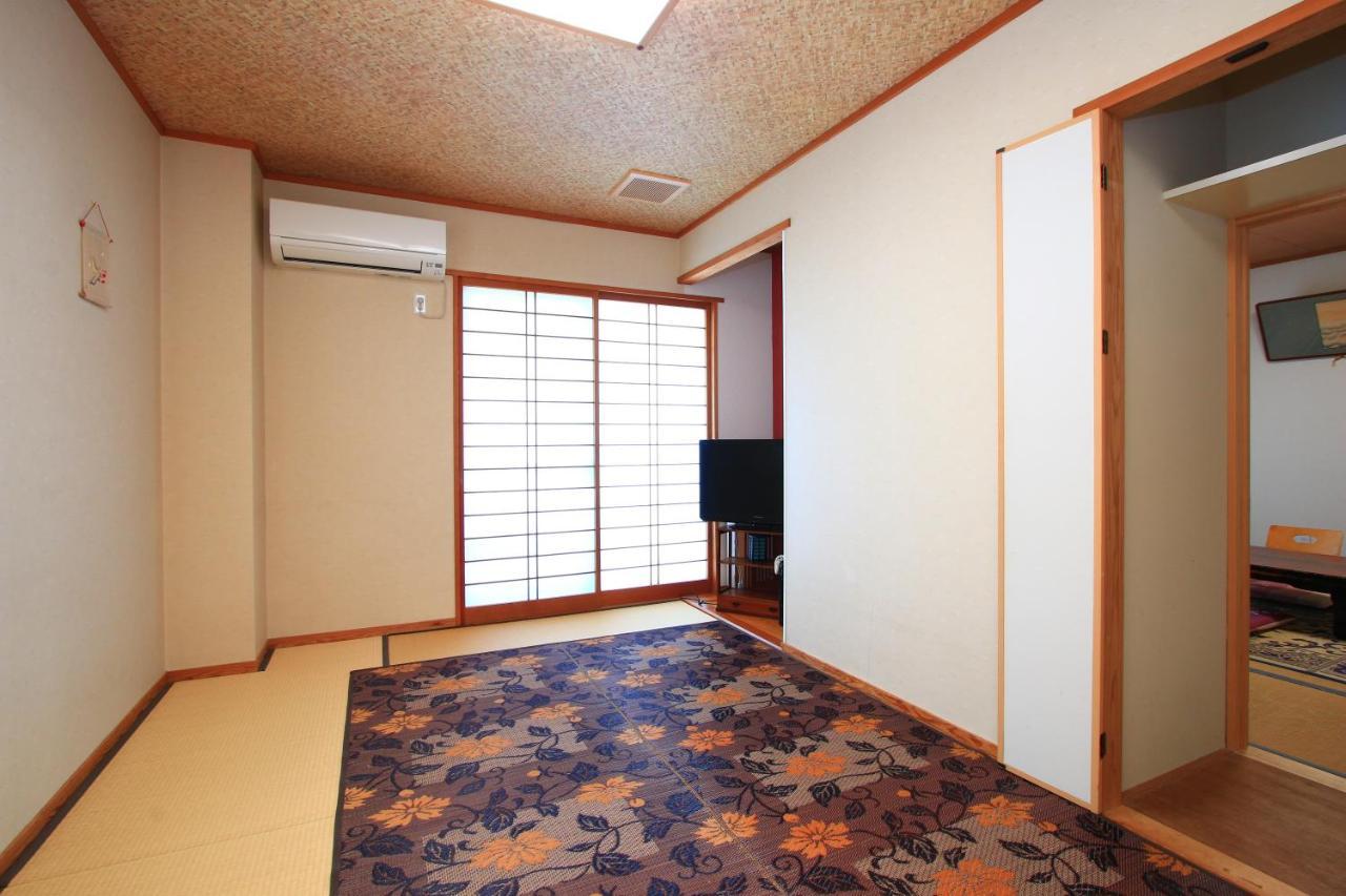 كورومي Ryokan Kinsui الغرفة الصورة